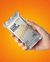Metallic Snack Bar in a Hand Mockup