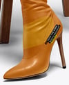 Pair of Over-The-Knee Boots on Women's Legs on Stool Mockup