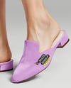 Pair of Suede Mules on Woman's Legs Mockup