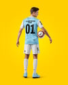 Man Wearing Soccer Jersey and Shorts Mockup