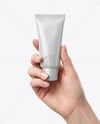 Matte Cosmetic Tube in a Hand Mockup
