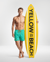 Young Man Wearing Shorts and Holding Surfboard Mockup
