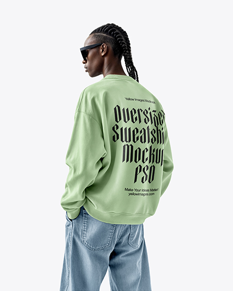 Man Wearing an Oversize Sweatshirt and Jeans Mockup