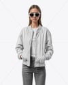 Woman in Sunglasses Wearing Bomber Jacket and Jeans Mockup