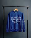Sweatshirt on a Wooden Hanger Against a Plain Background Mockup
