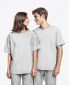 Young Couple Wearing Oversized T-shirts and Jeans Mockup