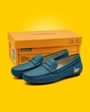 Pair of Women's Leather Moccasins with Shoe Box Mockup