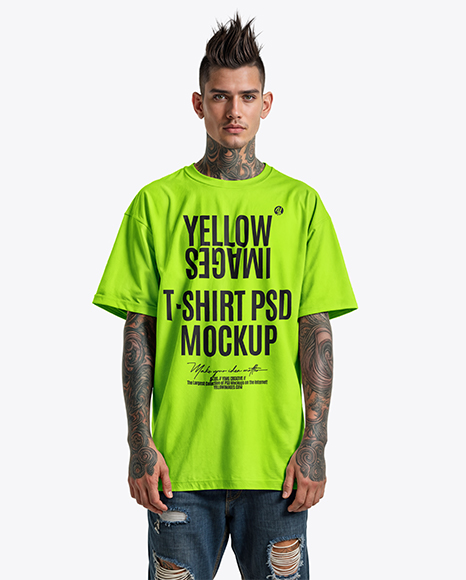 Man with Tattoo and Mohawk Hairstyle Wearing T-shirt Mockup - Jeans mockup