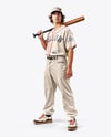 Young Man Wearing a Full Baseball Kit with Bat Mockup