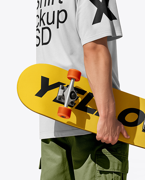 Young Man Wearing T-Shirt and Cargo Pants Holding Skateboard Mockup