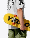 Young Man Wearing T-Shirt and Cargo Pants Holding Skateboard Mockup