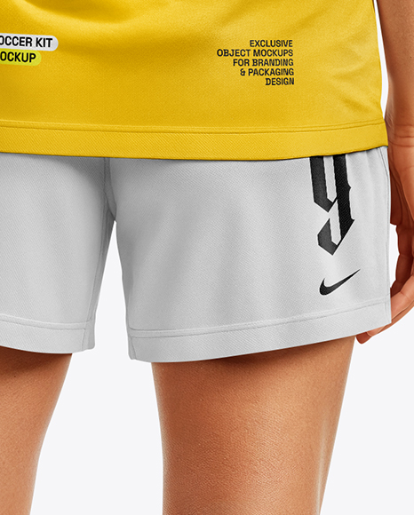 Female Soccer Player Wearing Jersey and Shorts Mockup