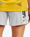 Female Soccer Player Wearing Jersey and Shorts Mockup