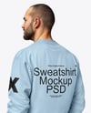 Man Wearing a Sweatshirt and Pants Mockup