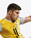 Man Wearing Soccer Jersey and Shorts Mockup