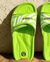 Slide Sandals Next to The Wall Mockup
