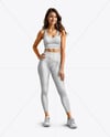 Woman Wearing a Crop Top and Leggings Mockup