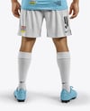 Soccer Player Wearing Jersey and Shorts Mockup