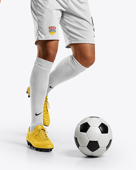 Soccer Player Wearing Crew Neck Jersey and Shorts Mockup