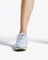 Woman Wearing Golf Shirt and Skirt Mockup