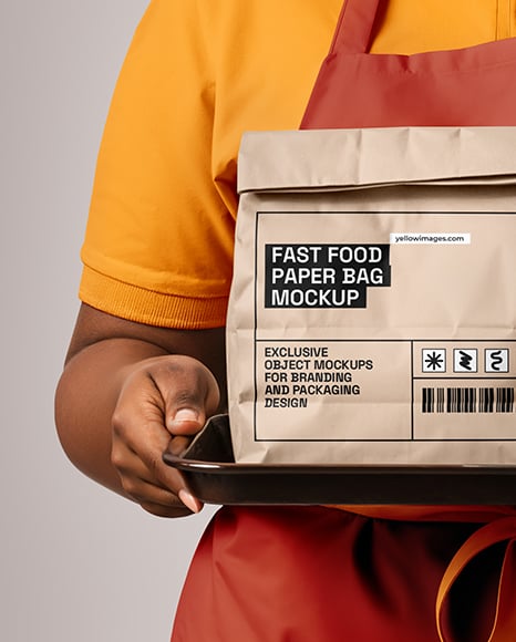 Female Fast Food Worker in Uniform with Paper Bag & Coffee Cup Mockup