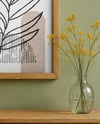 Framed Poster in a Living Room Mockup