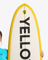 Woman Wearing Long Sleeve Rashguard and Bikini Bottom Holding Surfboard Mockup