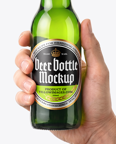 Green Glass Beer Bottle in a Hand Mockup