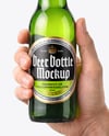 Green Glass Beer Bottle in a Hand Mockup