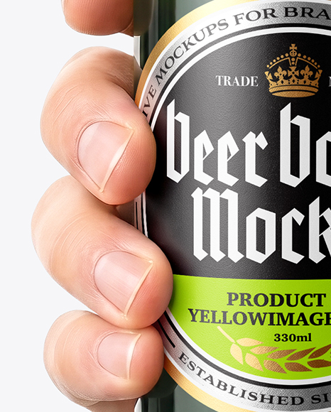 Green Glass Beer Bottle in a Hand Mockup