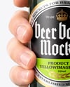 Green Glass Beer Bottle in a Hand Mockup