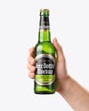 Green Glass Beer Bottle in a Hand Mockup
