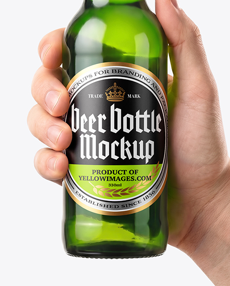 Green Glass Beer Bottle in a Hand Mockup