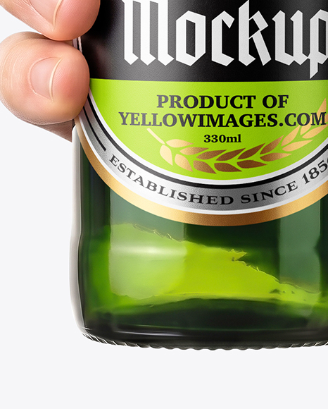 Green Glass Beer Bottle in a Hand Mockup