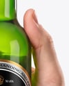 Green Glass Beer Bottle in a Hand Mockup