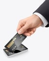Hand with Glossy Paper Business Card Mockup