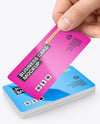 Hand with Glossy Paper Business Card Mockup