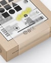 Kraft Paper Box in Translucent Plastic Sleeve Mockup