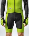 Man Wearing Cycling Jersey and Bib Shorts Mockup