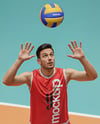 Man Wearing Full Volleyball Kit with Ball Mockup