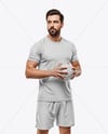 Man Wearing Handball Kit with Ball Mockup