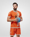 Man Wearing Handball Kit with Ball Mockup