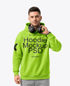 Man Wearing Hoodie with Headphones Mockup