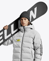 Man Wearing Puffer Jacket and Snow Pants with Snowboard Mockup