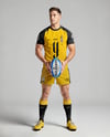 Man Wearing Rugby Uniform with Ball Mockup