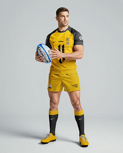 Man Wearing Rugby Uniform with Ball Mockup