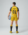 Man Wearing Rugby Uniform with Ball Mockup