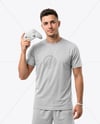Man with Game Controller Wearing eSports Jersey Mockup
