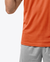 Man with Game Controller Wearing eSports Jersey Mockup