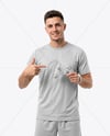 Man with Game Controller Wearing eSports Jersey Mockup